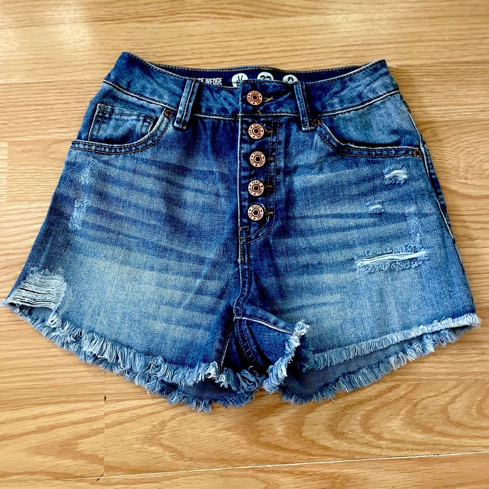 Medium wash slightly distressed high rise shorts